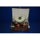 A small brown case containing old tins, oriental papier mache Bowl, Marble pen stand, Crucifix in a