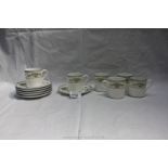 A Wedgwood part Coffee Set comprising six Cups and saucers, in Petersham pattern.