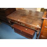 A superb Victorian Oak Writing Table by Collinson & Lock of London,