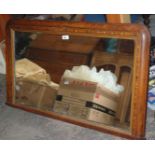 An Overmantle Mirror with wooden inlaid frame