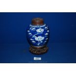 A blue and white oriental Prunus Ginger Jar,