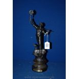 A French Art Nouveau Spelter Figure of a Workman Holding Plaque & Hammer Straddling a Steam Loco on