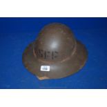 A WWl metal Fire Petrol Helmet marked SFP
