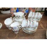 A Wedgwood 'Hathaway Rose' part Teaset including ten cups and tea plates, twelve saucers and a milk