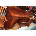 A Victorian Mahogany Sideboard with upstand back, plain rectangular top, central long frieze drawer