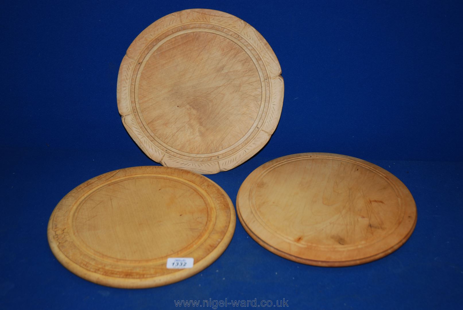 Three old carved Bread Boards