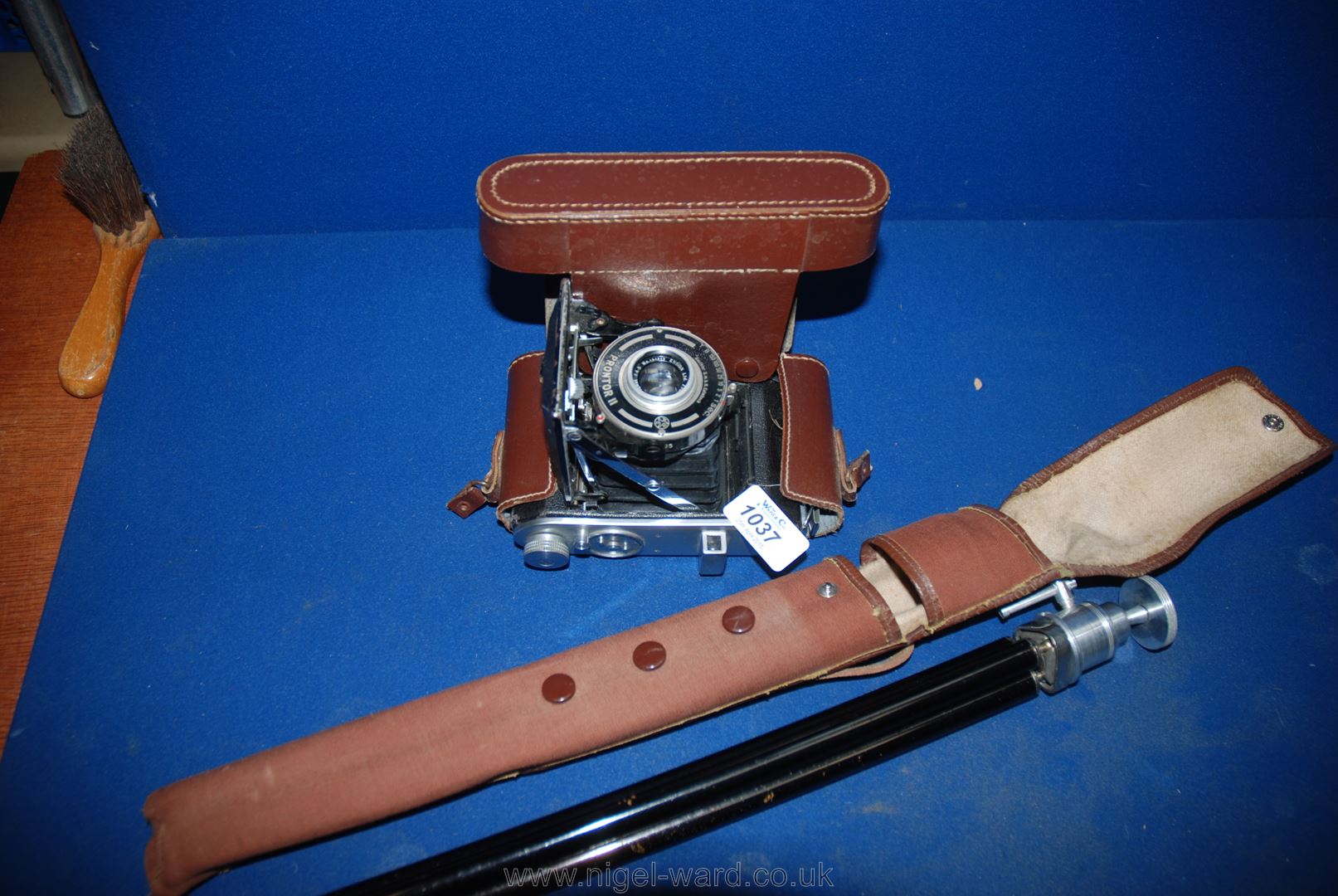 An Ensign 220 Selfix roll film folding bellows Camera with an Ensign Ensar 75mm  f/4.5 Lens and