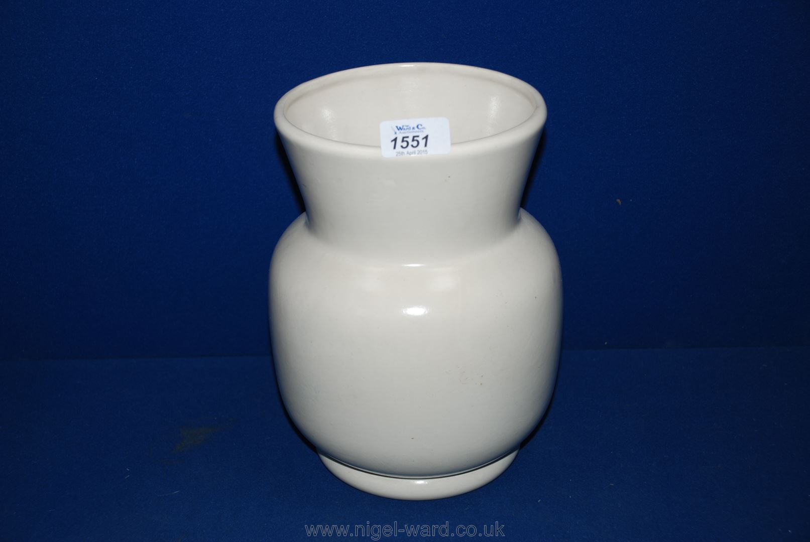 An undecorated Clarice Cliff Pot, 9 1/2'' high
