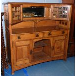 A particularly good arts and crafts Oak Sideboard,