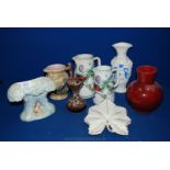 A quantity of Jugs and vases including Sylvac flower vase, graduated jugs with bird decoration,