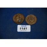 A pair of reproduction Roman Coins