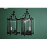 A pair of modern Italian metal and glass Wall Lanterns.
