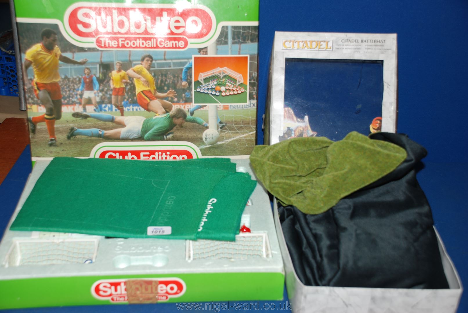 A boxed Subbuteo Club edition and a box of Citadel Battlement green baize.