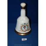 A Wade Decanter of Bells Whiskey to commemorate Queen Elizabeth ll 60th birthday - seal intact.