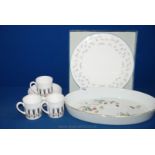 A boxed Royal Worcester 'Forgot Me Not' cake plate, five Susie Cooper 'Corinthian' pattern saucers