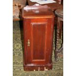A Victorian stained pine Pot Cupboard, shaped upstand back, rectangular moulded edge top, single