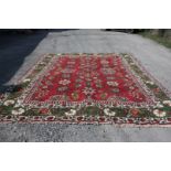 A large Turkish Rug 12 ft x 14 ft
