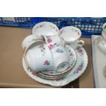 A Royal Stafford part Teaset of five cups, four saucers, sugar bowl and milk jug.