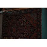 A vintage Persian hand knotted Rug with central medallion, 6'7'' x 4'5''.