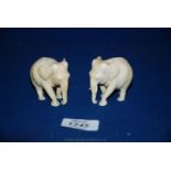 Two small carved ivory Elephants