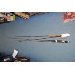 A John Norris two piece fibre fishing Rod and a Shakespeare Sigma Graphite 10 ft rod