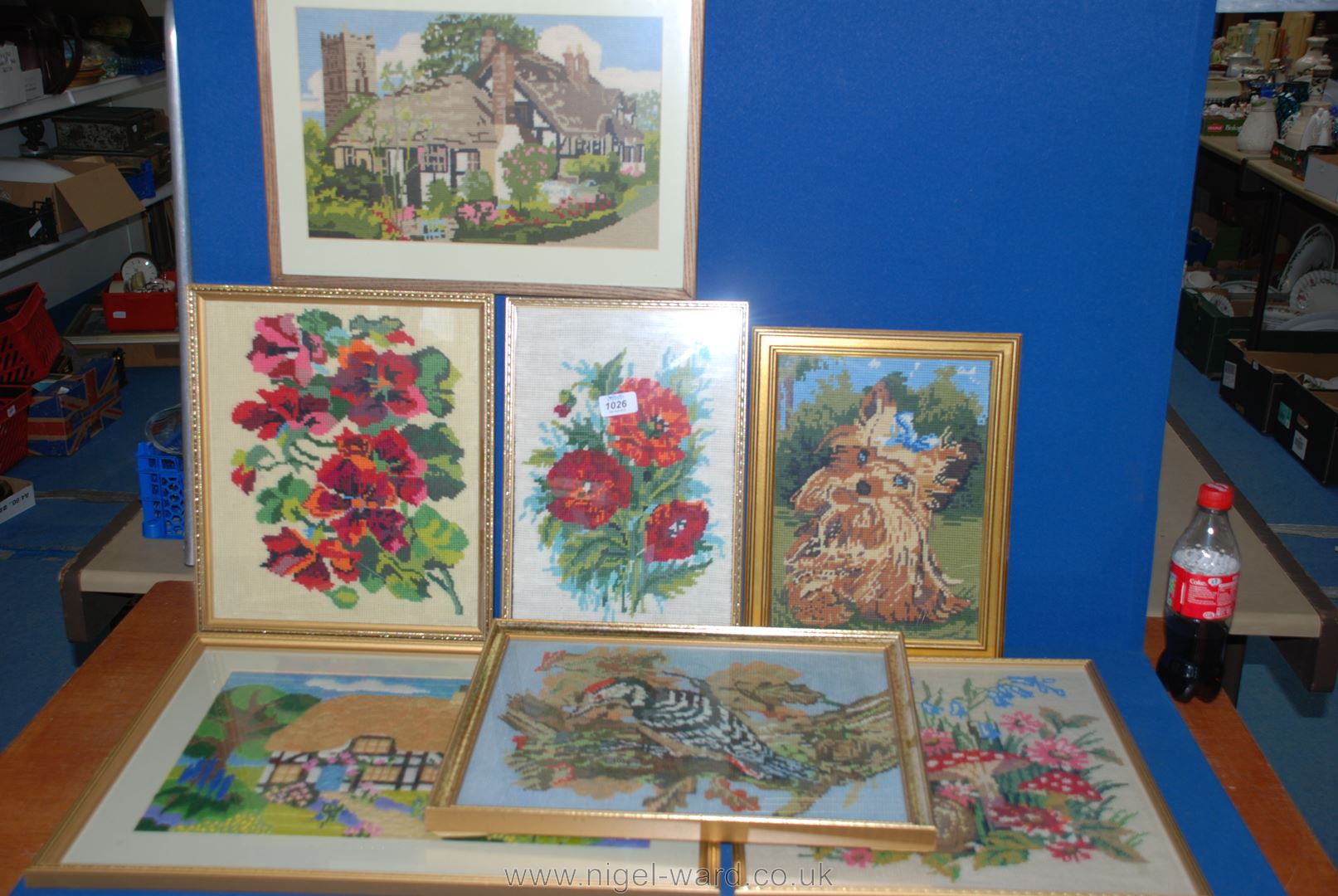 A quantity of framed wool Tapestries and embroidery including floral, scenes,