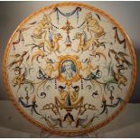 A Renaissance Urbino Plate delicately painted with grotteschi centred with the head of a scholar.