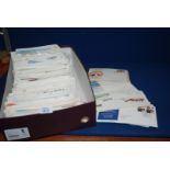 A box containing a quantity of First Day covers