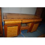 A Victorian Sideboard in drag light and dark stained finish, rectangular top with leaf decoration