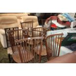 A good set of six Arts and Crafts Oak Dining Chairs, including two carvers, stick back with solid