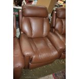 A modern brown leather upholstered Armchair with electrically reclining back