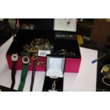 A box of Costume Jewellery including three Wristwatches, a Silver Pendant and Chain, two Rings and