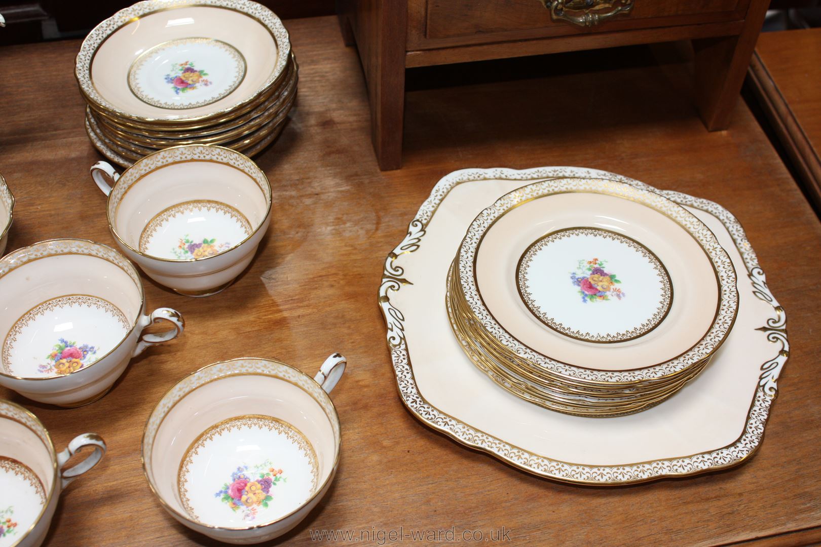 A Paragon Teaset, pale peach ground with floral decoration, comprising, Teapot, milk jug, - Image 3 of 6