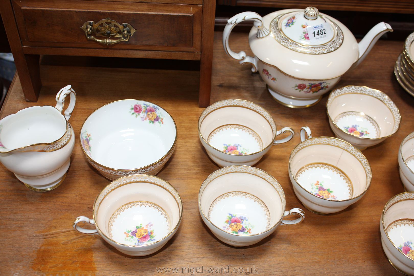 A Paragon Teaset, pale peach ground with floral decoration, comprising, Teapot, milk jug, - Image 2 of 6