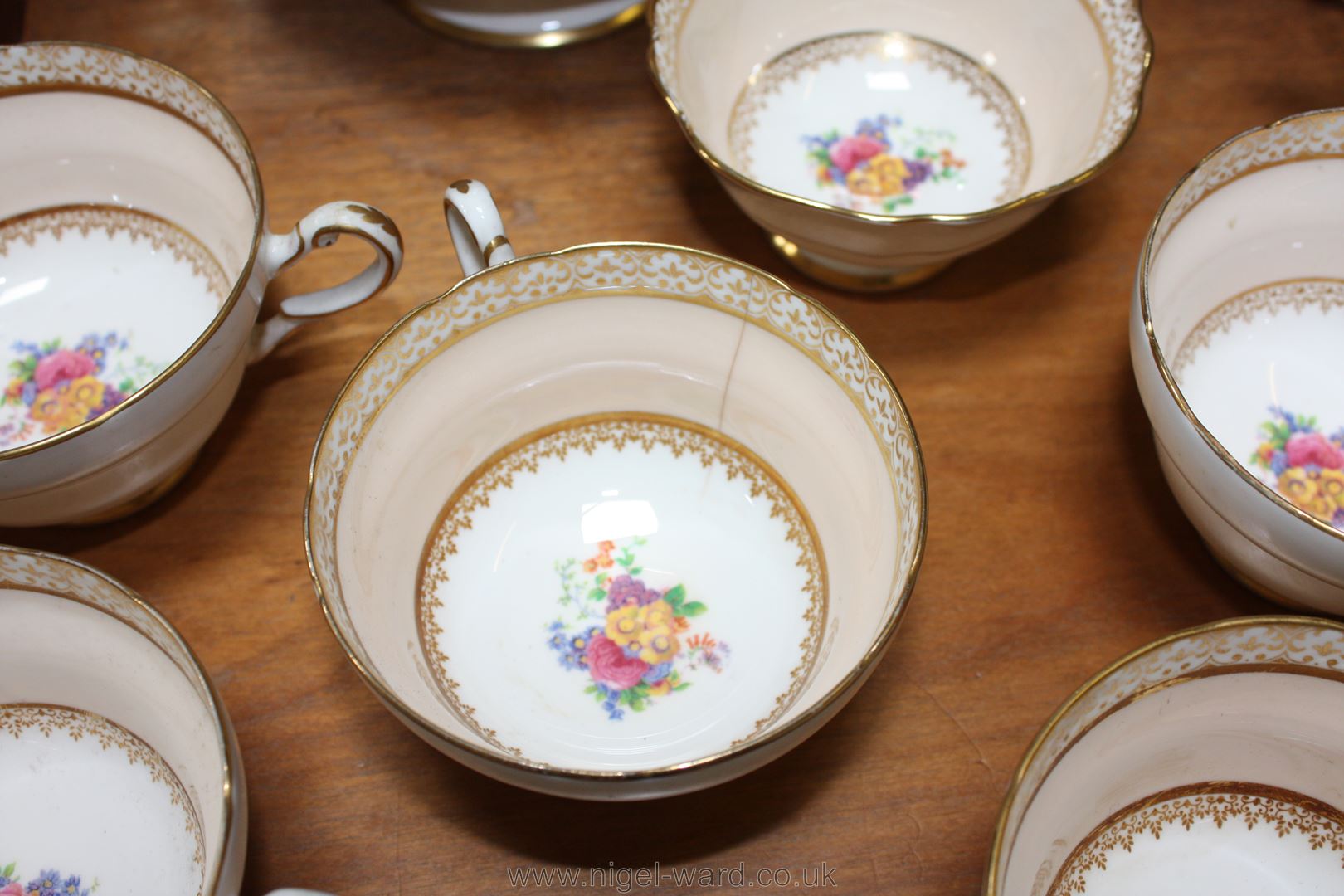 A Paragon Teaset, pale peach ground with floral decoration, comprising, Teapot, milk jug, - Image 4 of 6