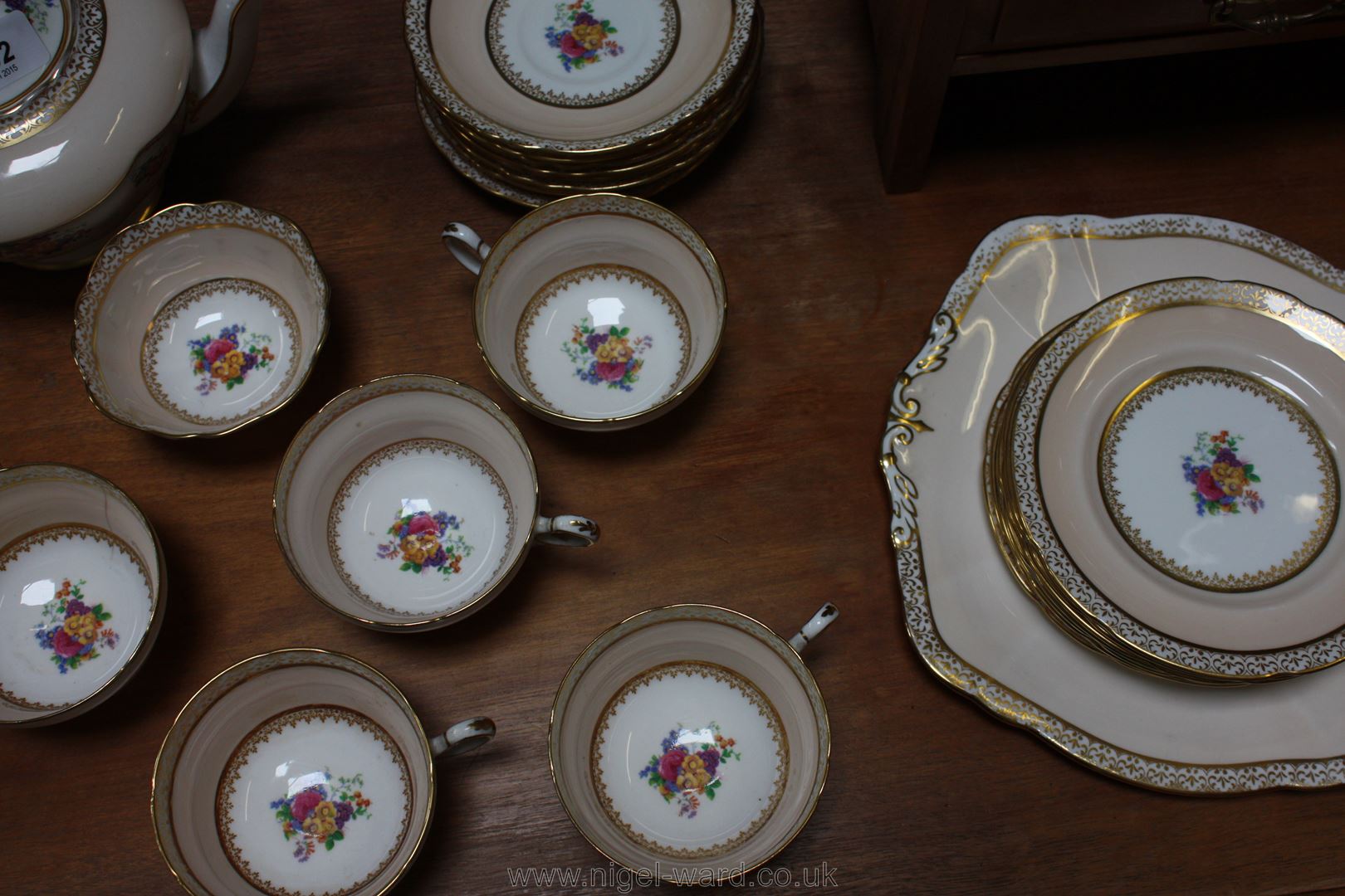 A Paragon Teaset, pale peach ground with floral decoration, comprising, Teapot, milk jug, - Image 6 of 6