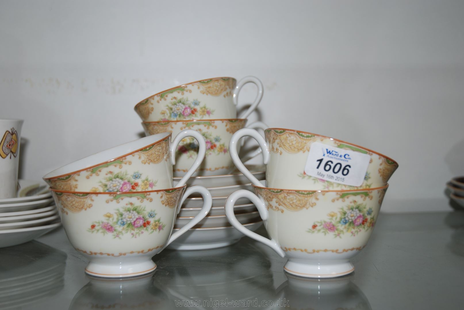 Six Noritake Cups and saucers with floral decoration,