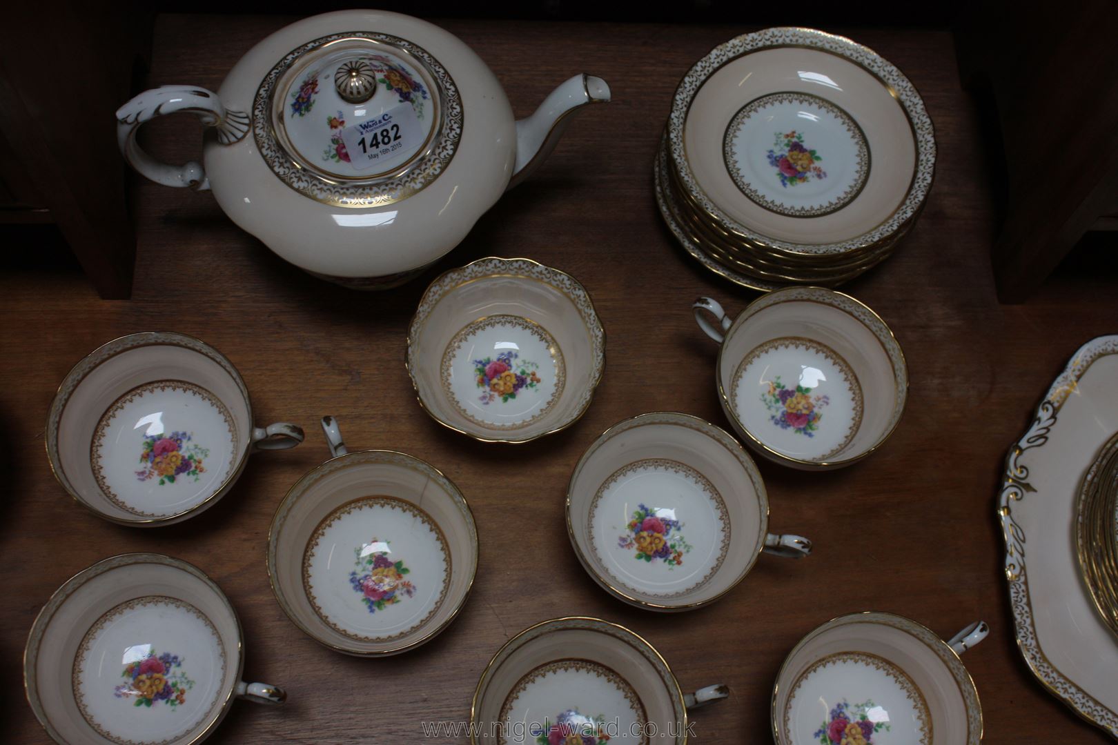 A Paragon Teaset, pale peach ground with floral decoration, comprising, Teapot, milk jug, - Image 5 of 6