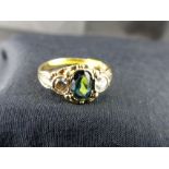 9 ct gold blue & white three stone dress ring. Size P.