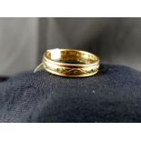 9 ct gold diamond set band with engraved love poem inside. Size M