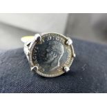 Sterling silver ring set with silver threepence. Size O.
