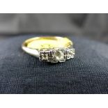 9 ct gold & platinum three stone ring. Interior stamped Lifetime. Size L.