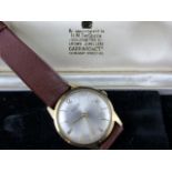 Boxed 9 ct gold Garrard automatic wristwatch.with 1969 inscription. Back weight 4.5g. Working at