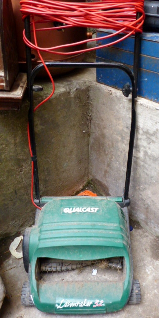 Electrically powered Qualcast lawnraker 32