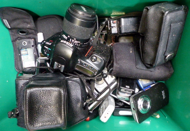 Box of cameras and mobile phones