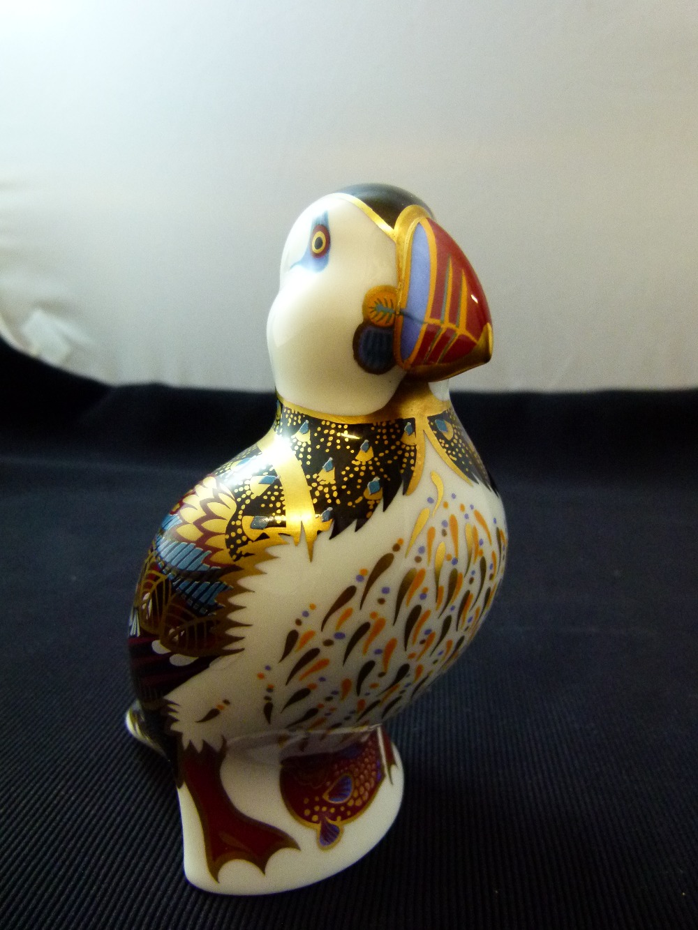 Royal Crown Derby Puffin paperweight with gold stopper. H: 12cm