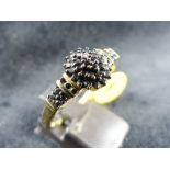 9 ct gold fancy black diamond cluster ring.