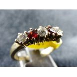 9 ct gold garnet & CZ five stone ring. Size P/Q.