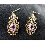 9 ct gold amethyst mounted drop earrings.