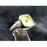 Sterling silver cushion cut yellow stone ring. Size N.